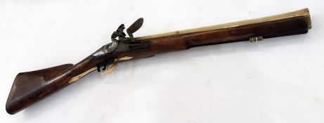 Late 18th century brass barrelled flintlock blunderbuss, proof marks to barrel (ram rod missing)
