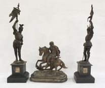 Pair of spelter figures bearing flags, raised on black slate bases and further spelter figure of man