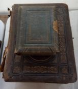 Three various photograph albums, one with floral decorated pages containing Victorian, sepia and