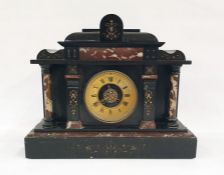 Black slate and rosso marble mantel clock in the Greco-Roman architectural taste with Roman numerals