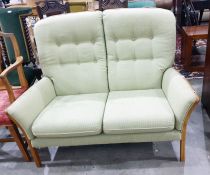 S Rouse & Co two-seater sofa in green upholstery