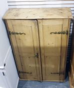 Late 19th/early 20th century pine two-door cupboard, the doors opening to reveal shelves, 83.5cm x