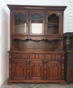 20th century pine dresser with two doors above open recess and base of three drawers, three cupboard