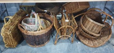 Various baskets including a wicker magazine rack, picnic basket, log basket and others, etc
