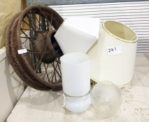 A vintage cast iron wheel, pair of bedside lamps, a pair of small brass coloured table lamps, a