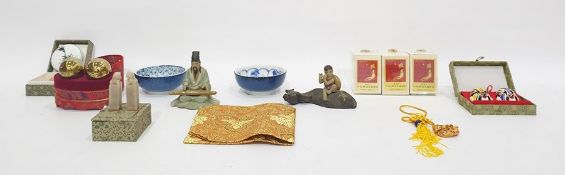 Two Chinese figurines one with water buffalo and boy sitting  astride and a collection of boxed