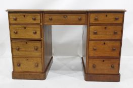 19th century mahogany breakfront desk with nine assorted drawers, raised upon plinth base, 122cm x