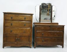 20th century oak chest of three drawers above two cupboard doors and a dressing chest with three-