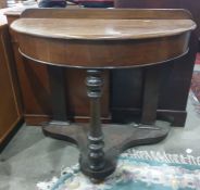 Oak demi-lune side table with turned front supports, shaped platform base