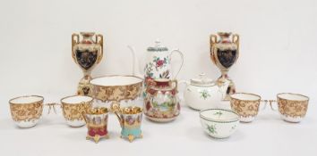19th century continental porcelain part teaset with white ground decorated with gilt scrolls,