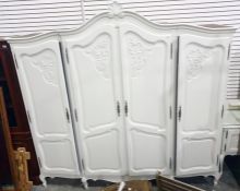 White painted four-door armoire raised on cabriole supports, 220cm x 213cm