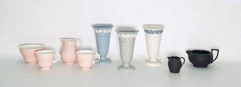 Three various Wedgwood porcelain Queensware vases, a Wedgwood bone china white and pink milk jug,