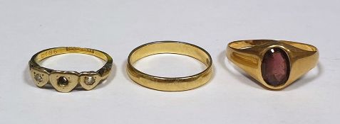 9 ct gold wedding band, 18 ct dress ring and a gold coloured ring