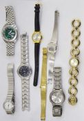 Five boxes of assorted costume jewellery to include wristwatches, necklaces, brooches, etc (5)
