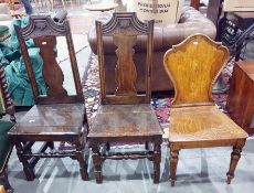 Pair of 18th century-style oak chairs with vase-shaped back splats, wooden seat and turned block