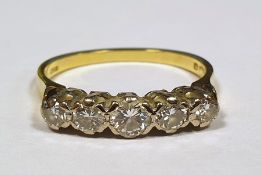 18 ct gold and five stone diamond ring Condition Reportthe larger stone is approx 3 mm the rest