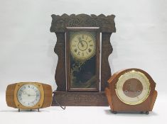 Late 19th/early 20th century American mantel clock in carved Art Deco style oak case, the movement