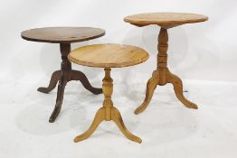 Three circular occasional centre tables including elm-topped table on turned supports and cabriole