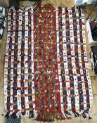 Large multi-coloured cotton kelim-style rug with hand knotted loose threads and fringes at two ends,