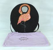 Lulu Guinness circular straw beach bag embroidered with a flamingo in raffia on straw, with carry