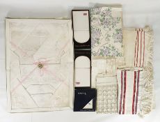 Large quantity of assorted table linen including damask tablecloths, hand towels, mats, assorted