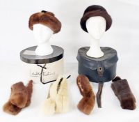 Brown mink hat labelled 'Edna Wallace', another dark mink hat and various mink tippets , a cardboard