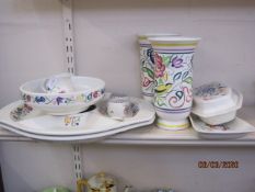 Pair of Poole Pottery vases with floral and bird decoration and other Poole Pottery tableware,
