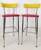Pair of 20th century bar stools with yellow backs, red seats and chrome frames (2)