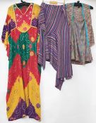 Peasant-style kaftan with batwing sleeves, embroidered detail to the bodice, a Gina Ferrari