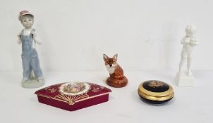 Royal Doulton model of a fox, a Lladro figure of a boy wearing a cap and dressed in blue