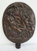 19th century bronze relief plaque of a satyr playing an instrument with a cherub beside him, oval,