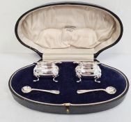 Pair silver salts, each square with shaped serpentine everted rim, gilded interiors, bulbous base,