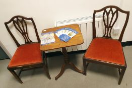 Corner cupboard, two chairs and a side table