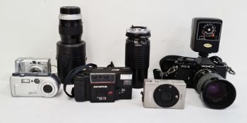 Collection of various digital cameras, lens, pouches, cases etc. ( 1 box)