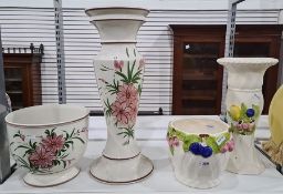 Jardiniere and stand with fruit in relief with a matching tall vase and another painted with pink
