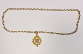 9ct gold ‘Metropolitan Academy of Music’ medal dated 1926 and a 9ct gold oval link chain bracelet,