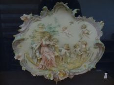 Pair of continental porcelain wall plaques, framed and glazed