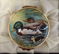 Moorcroft enamel trinket pot, cylindrical and decorated with ducks and ducklings among bulrushes,