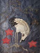 Oriental embroidery Heron embroidered on blue silk ground, raised, with a glass(?) eye, leaves and