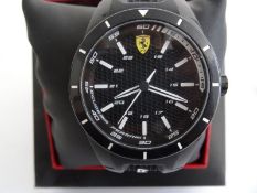 Gent's Ferrari Scuderia wristwatch with black dial and black rubber strap, in presentation box