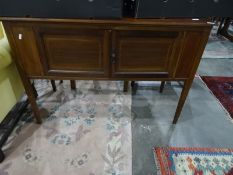 Early 20th century walnut two-door cabinet on square section tapering supports, 106.5cm x 74cm