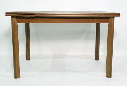 20th century extending dining table, the rectangular top with draw-leaves, on four supports and a