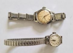 Lady's Omega stainless steel wristwatch with faceted bezel and a lady's Omega stainless steel