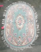 Chinese superwash oval rug, 150cm x 92cm