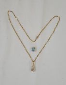 14K gold and white stone pendant set pear drop shaped stone, on fine 9ct gold twist chain and 10K