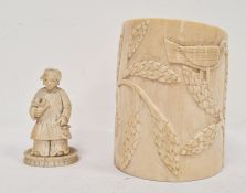 Early 20th century Chinese carved ivory chess piece figure, 6.5cm and an early 20th century