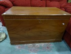 Brown painted wooden trunk on plinth base, 103cm x 59.5cm