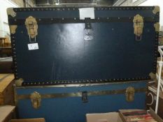 Two large canvas and metal-banded travelling trunks (2)