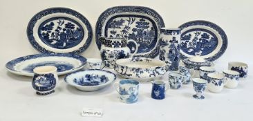 Pair Masons pottery cylindrical vases, willow pattern, sundry meat dishes and other blue and white