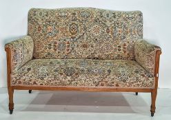 Early 20th century three-piece suite comprising two-seater sofa and two armchairs, with exposed